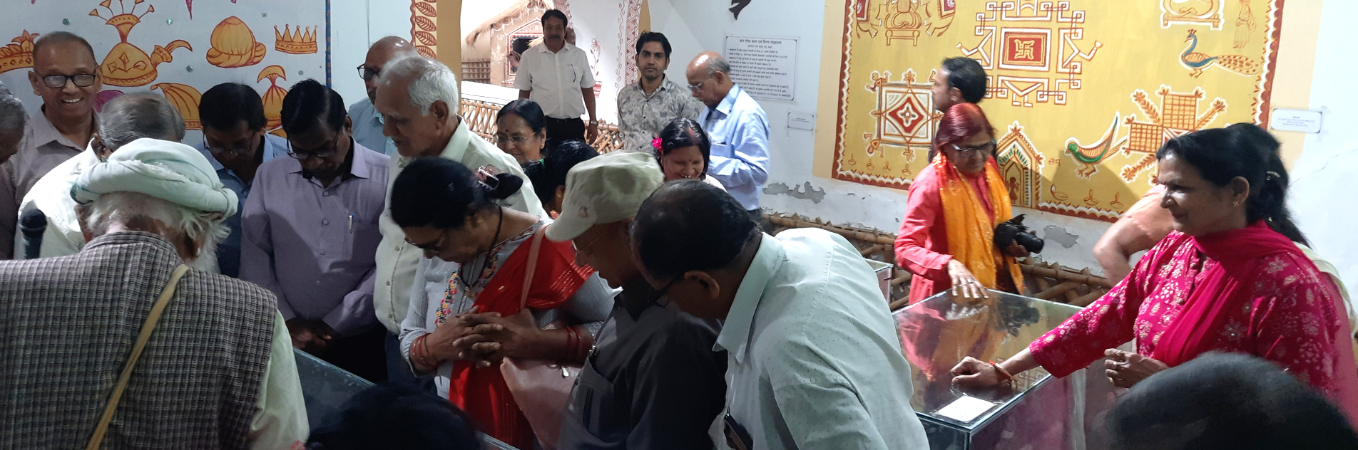 Sunset over mountains with vibrant orange and purple sky